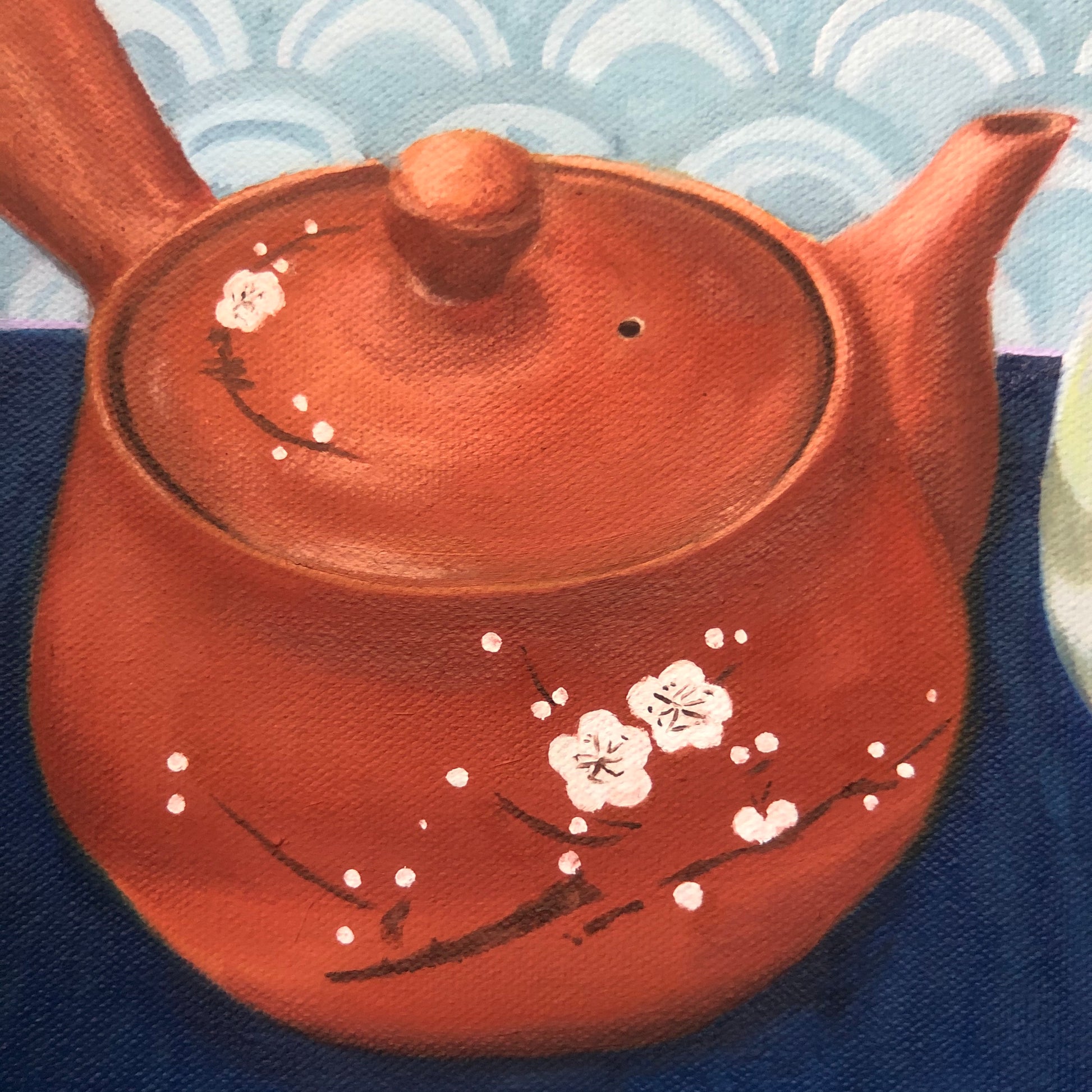 still life oil painting of terra cotta Japanese teapot with sakura branch and blossoms painted on the side and lid